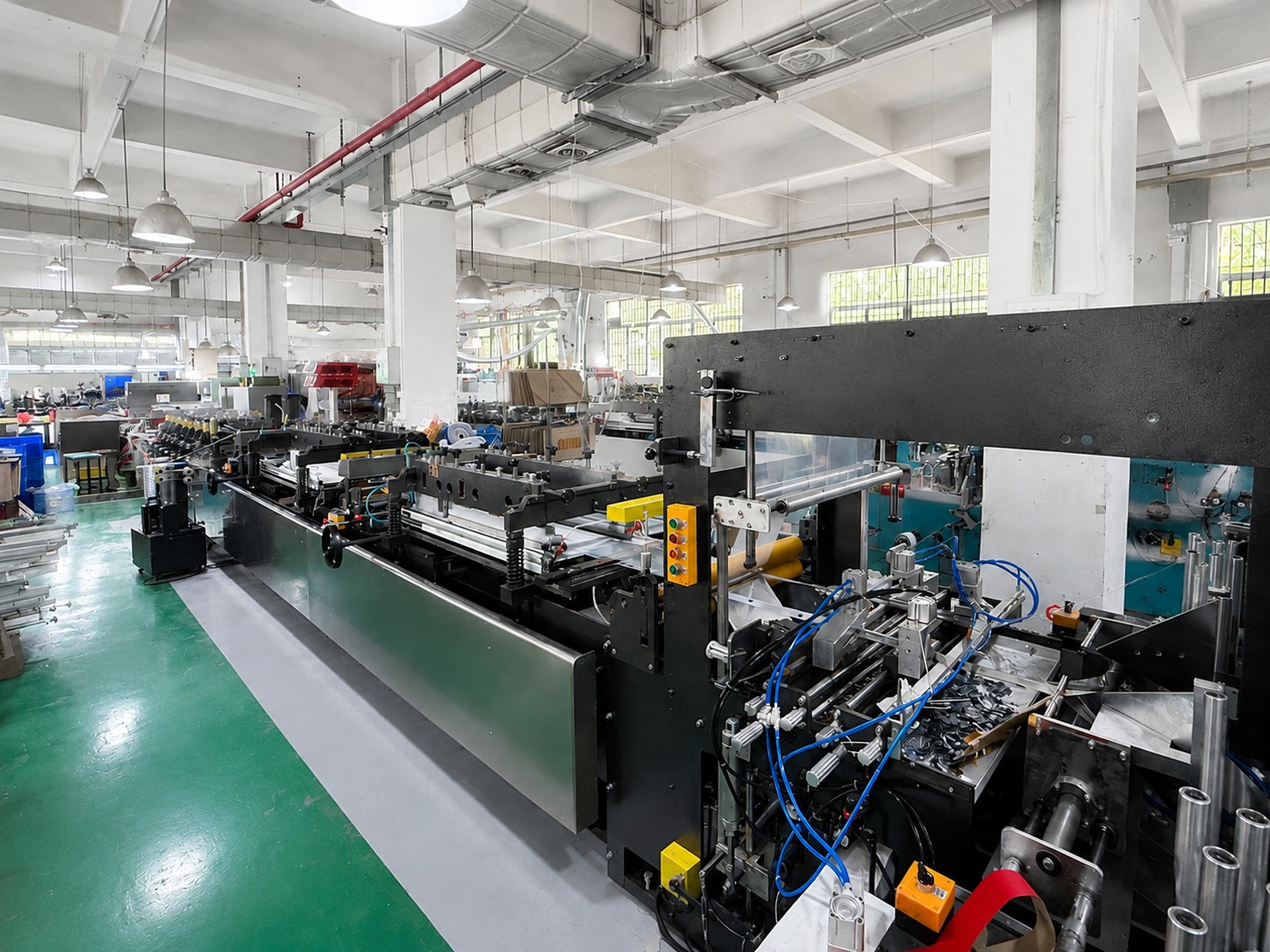 Flexible packaging pouch making production line